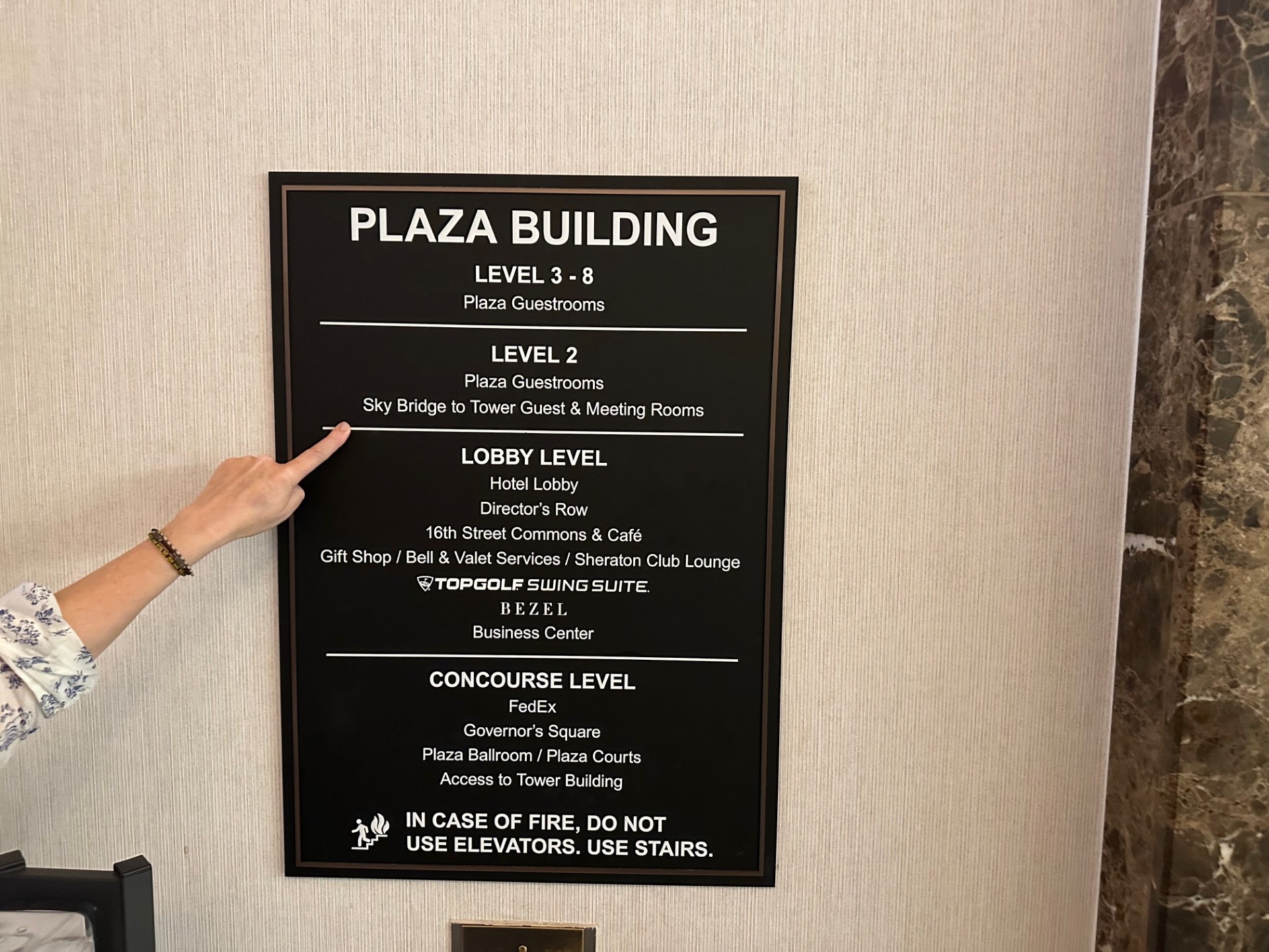 Plaza Building directory showing different levels including Lobby Level and Concourse Level